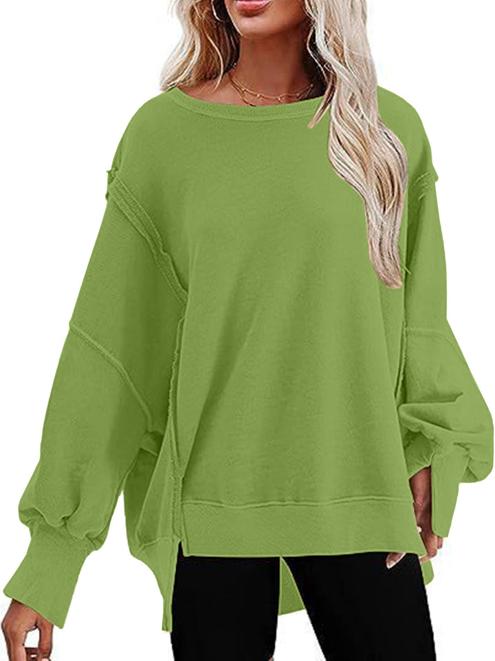 Damer avslappnad oversized tröja med voluminösa ärmar Mirla-Eva Jonsson