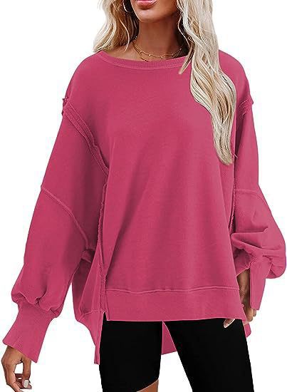 Damer avslappnad oversized tröja med voluminösa ärmar Mirla-Eva Jonsson
