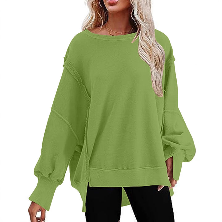 Damer avslappnad oversized tröja med voluminösa ärmar Mirla-Eva Jonsson