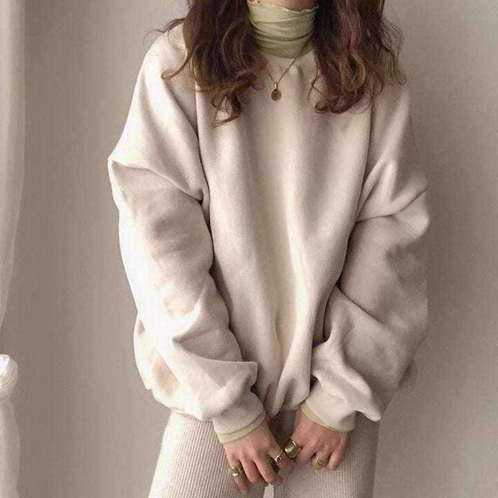 Damer avslappnad oversized tröja med voluminösa ärmar Mirla-Eva Jonsson
