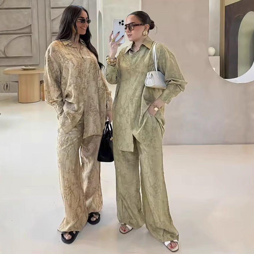 Damer avslappnad set med elegant topp och vida byxor Mirla-Eva Jonsson