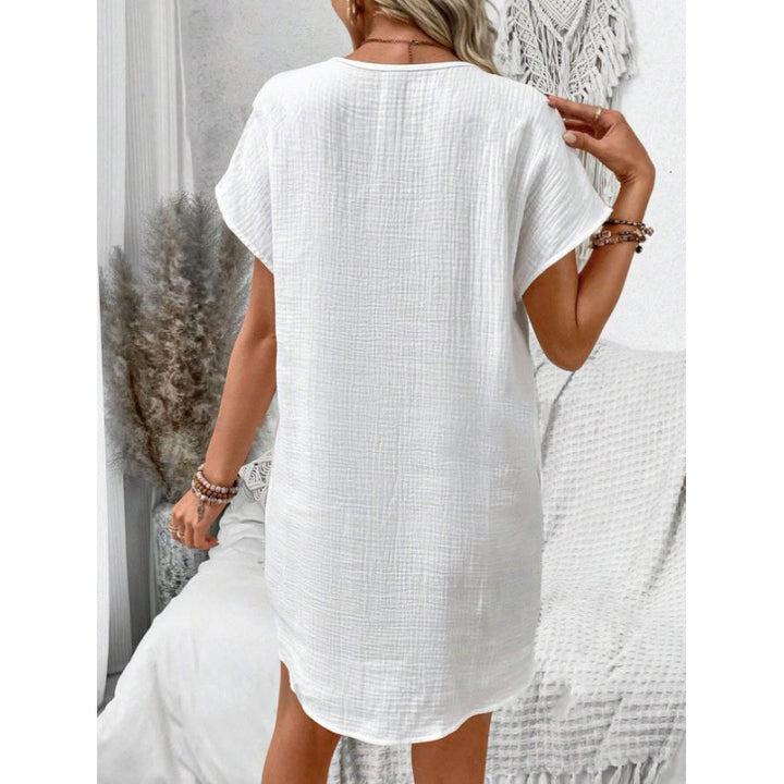 Damer avslappnad skjortklänning med knappdetaljer och sidfickor Eva Jonsson-Eva Jonsson