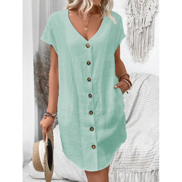 Damer avslappnad skjortklänning med knappdetaljer och sidfickor Eva Jonsson-Eva Jonsson