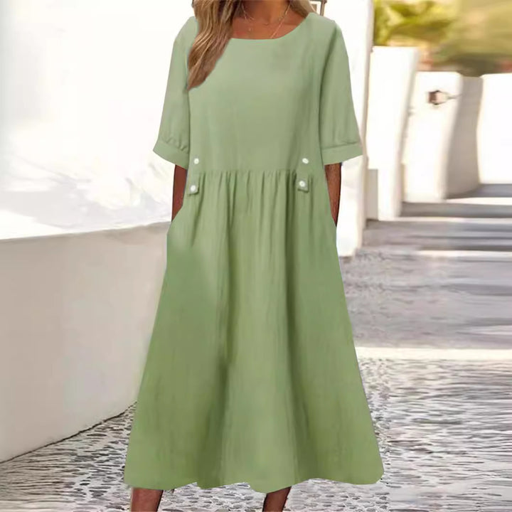 Damer avslappnad sommarklänning med fickor och flödande snitt Mirla-Eva Jonsson