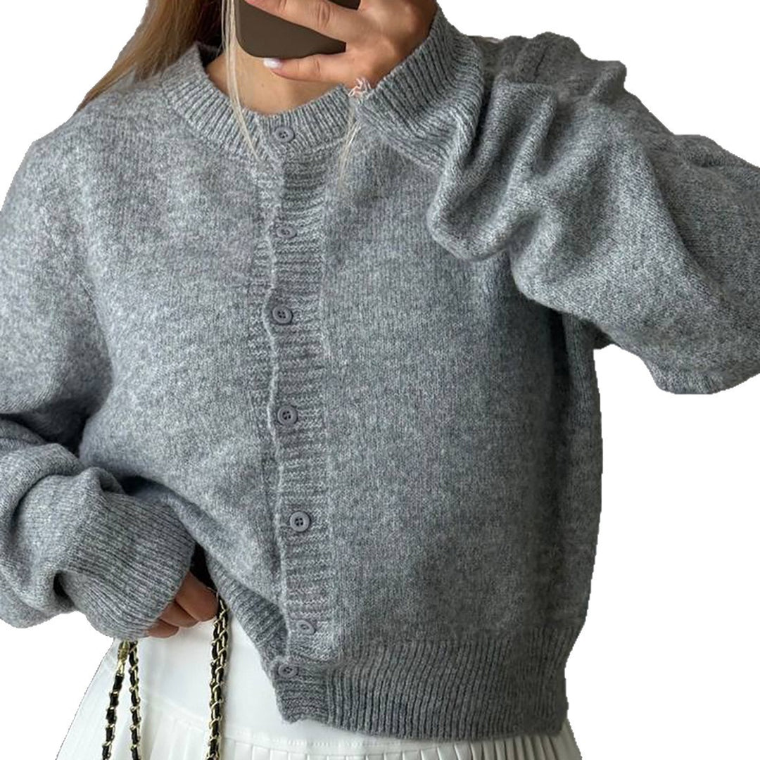 Damer avslappnad st cardigan med knappslå och fast ribbad mudd Mirla-Eva Jonsson