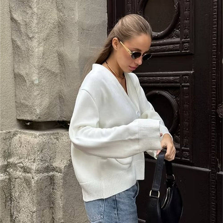 Damer avslappnad stickad cardigan med stora fickor och knäppning Mirla-Eva Jonsson