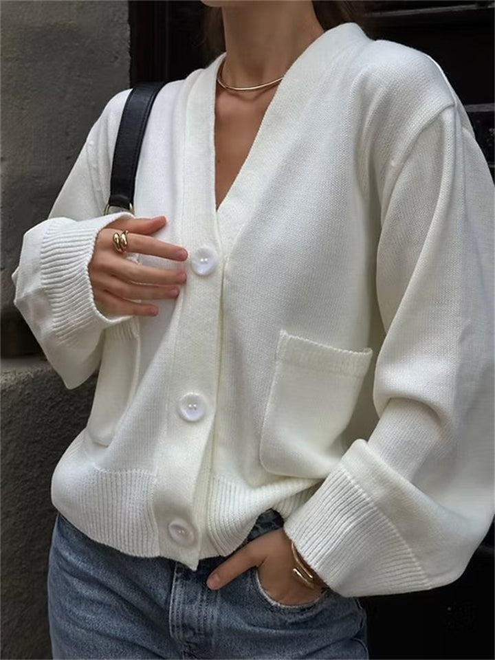 Damer avslappnad stickad cardigan med stora fickor och knäppning Mirla-Eva Jonsson