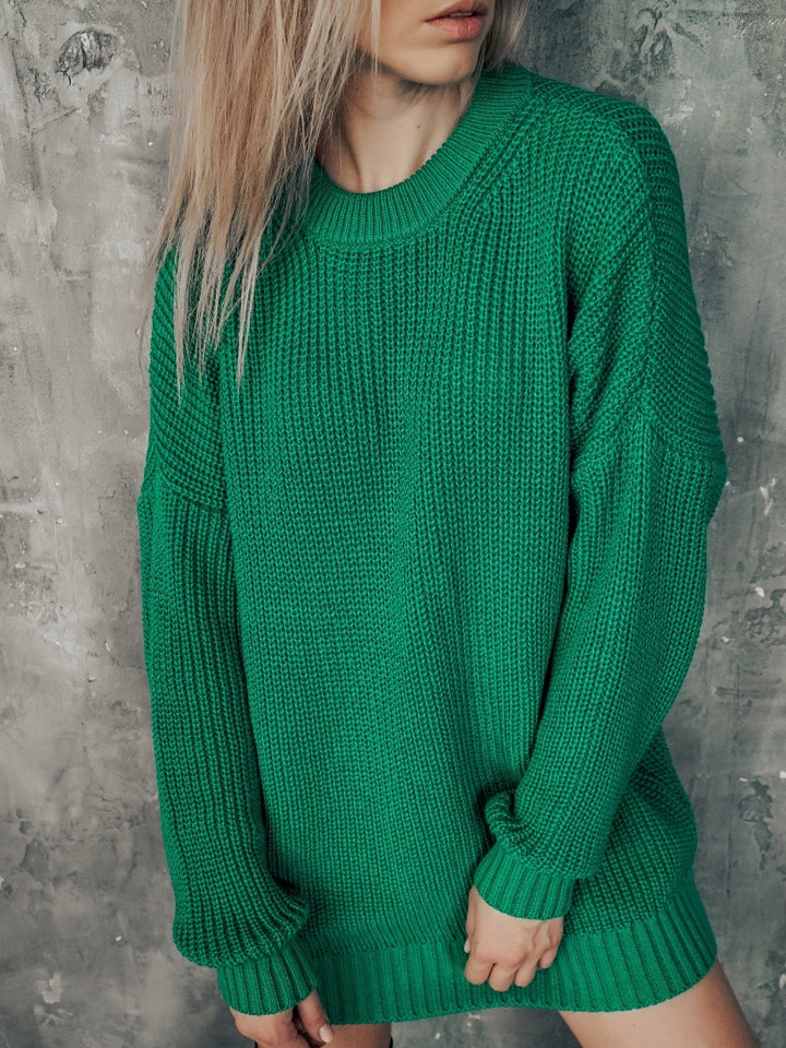 Damer avslappnad stickad klänning med oversized snitt och stiligt bälte Mirla-Eva Jonsson