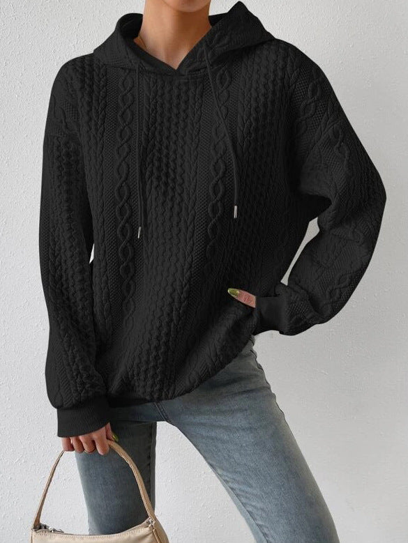 Damer avslappnad stickad tröja med huva och strukturerad design Mirla-Eva Jonsson