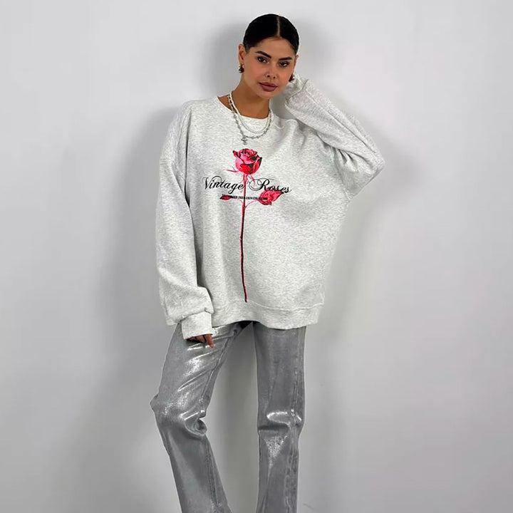 Damer avslappnad sweatshirt med blommig tryck Mirla-Eva Jonsson