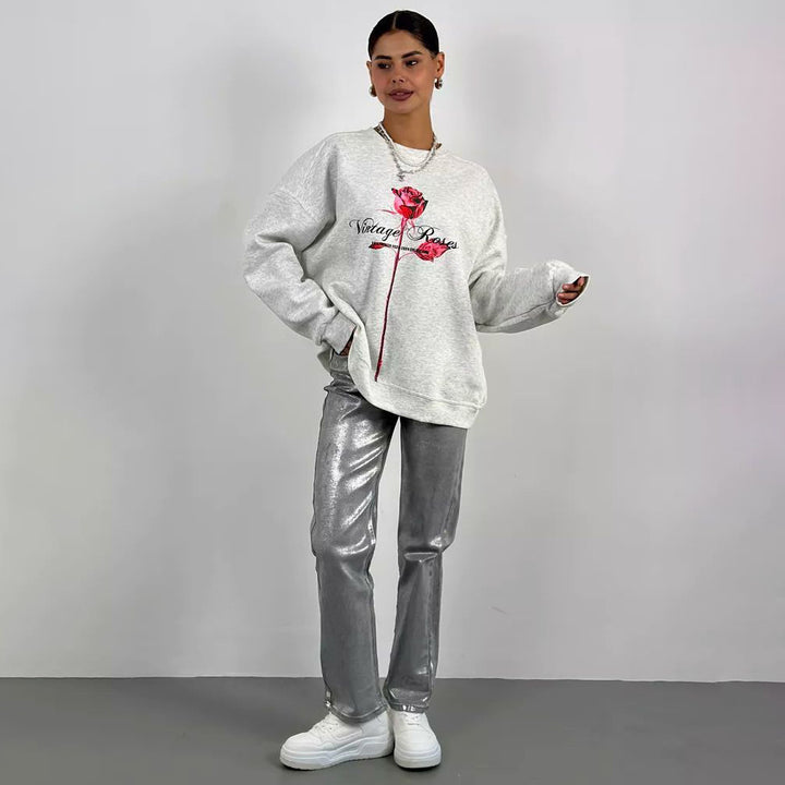 Damer avslappnad sweatshirt med blommig tryck Mirla-Eva Jonsson