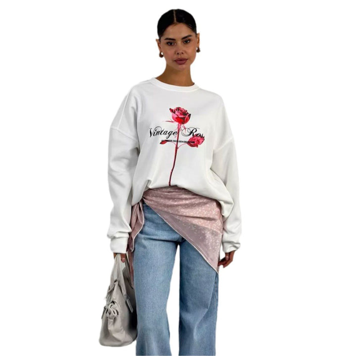 Damer avslappnad sweatshirt med blommig tryck Mirla-Eva Jonsson