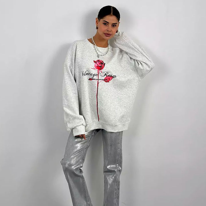 Damer avslappnad sweatshirt med blommig tryck Mirla-Eva Jonsson