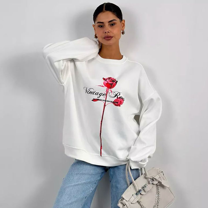 Damer avslappnad sweatshirt med blommig tryck Mirla-Eva Jonsson