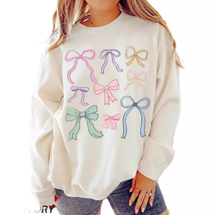 Damer avslappnad sweatshirt med färgglada rosettmotiv Mirla-Eva Jonsson
