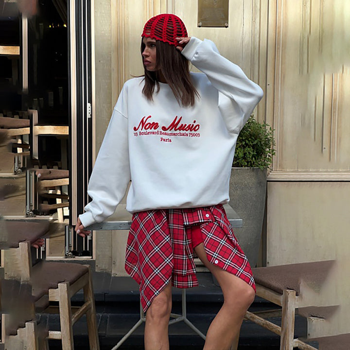 Damer avslappnad sweatshirt med grafisk text Mirla-Eva Jonsson