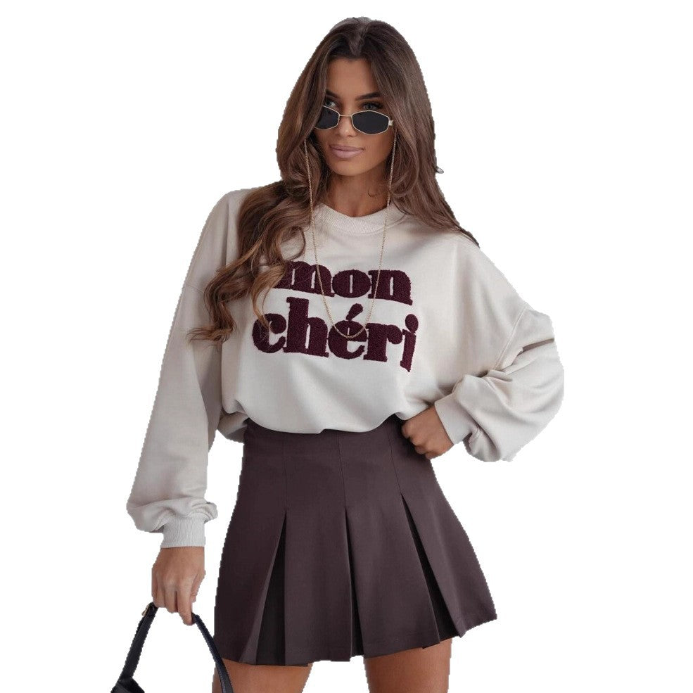 Damer avslappnad sweatshirt med iögonfallande text och modern skärning Mirla-Eva Jonsson