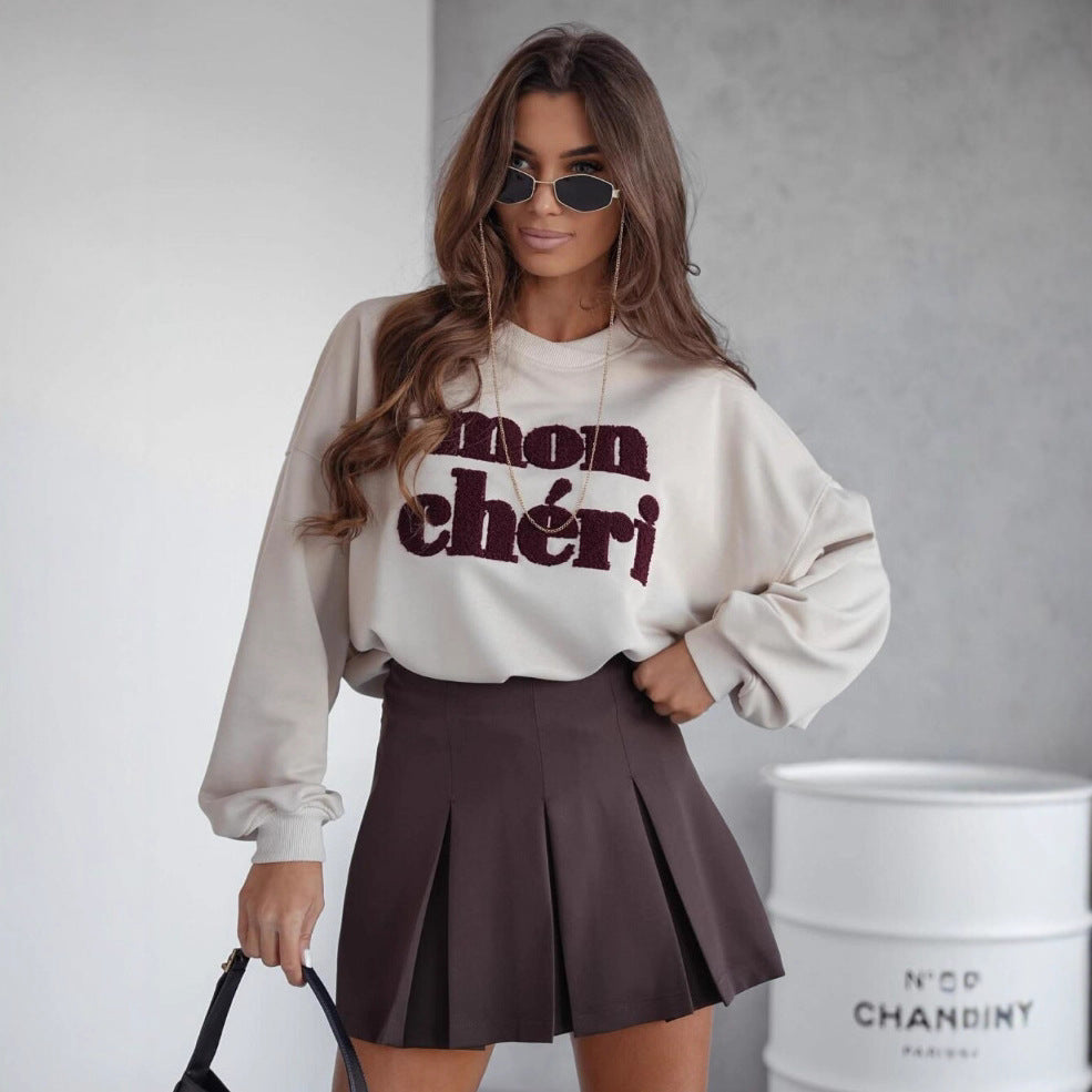 Damer avslappnad sweatshirt med iögonfallande text och modern skärning Mirla-Eva Jonsson