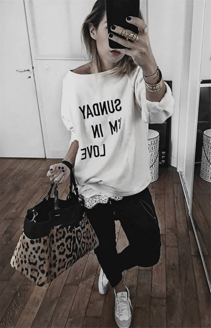 Damer avslappnad sweatshirt med kreativt tryck Mirla-Eva Jonsson