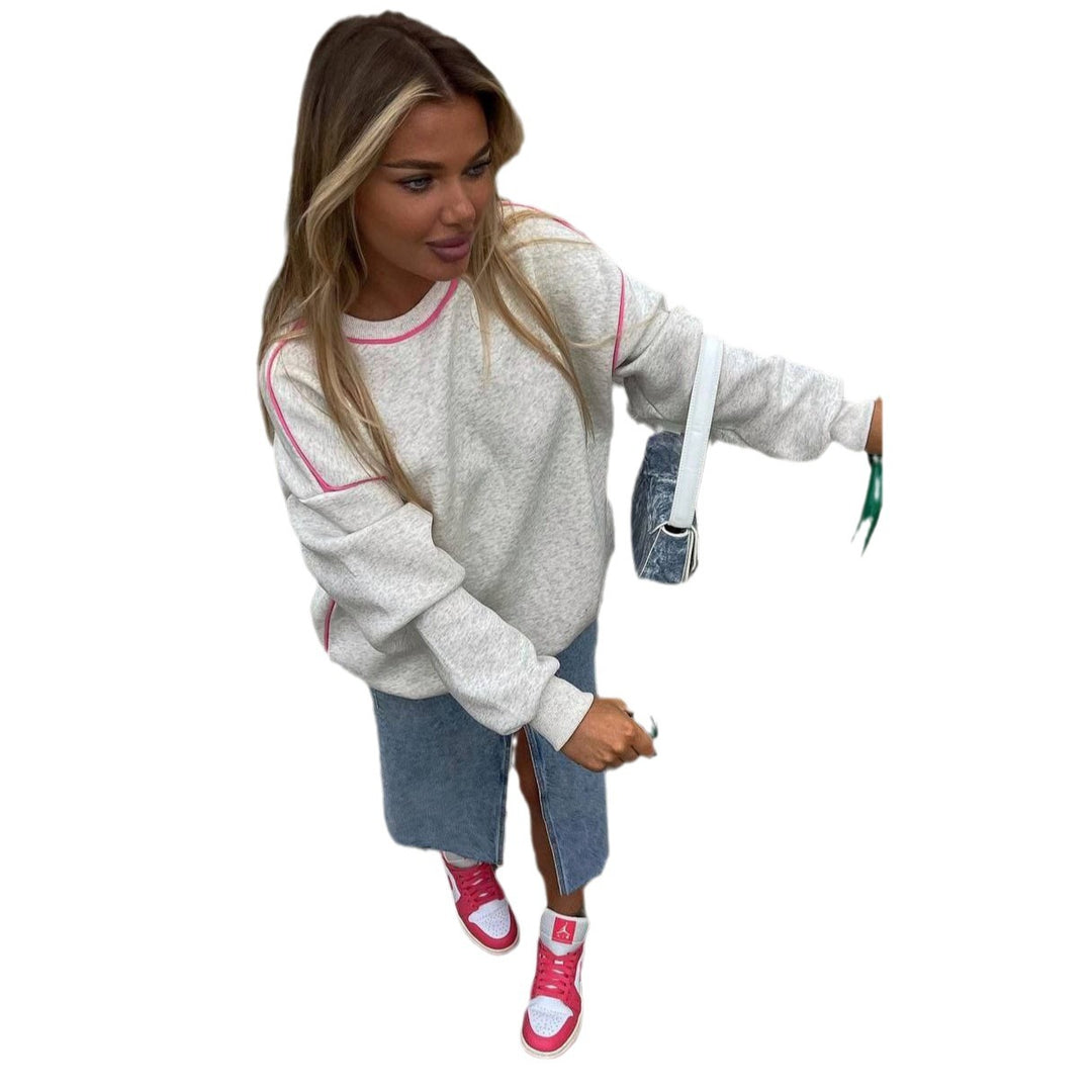 Damer avslappnad sweatshirt med moderna kontraststygn Mirla-Eva Jonsson