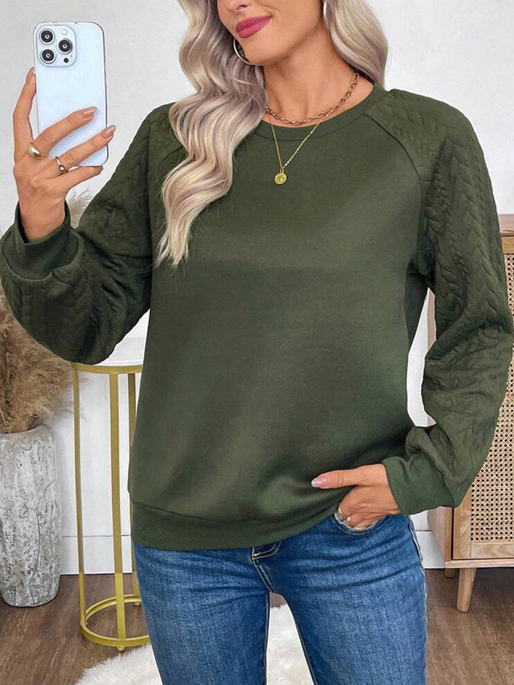 Damer avslappnad sweatshirt med strukturerade ärmar Mirla-Eva Jonsson