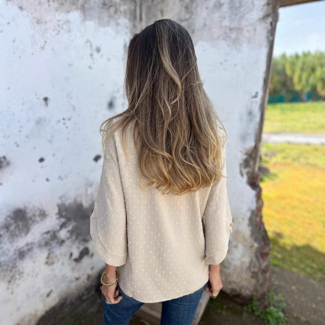 Damer avslappnad topp med strukturerad design och exklusiva knappprocesser Mirla-Eva Jonsson