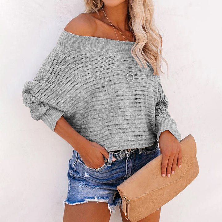 Damer avslappnad tröja med off-shoulder design och strukturerat stickmönster Mirla-Eva Jonsson
