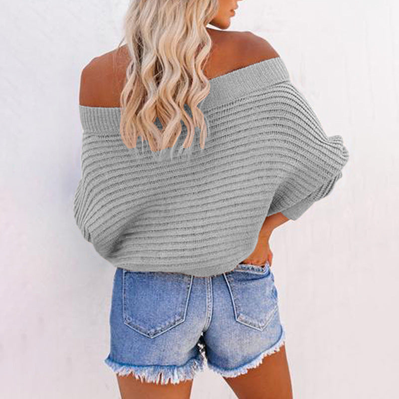 Damer avslappnad tröja med off-shoulder design och strukturerat stickmönster Mirla-Eva Jonsson