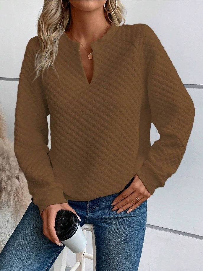 Damer avslappnad tröja med strukturerad design och hög krage Mirla-Eva Jonsson