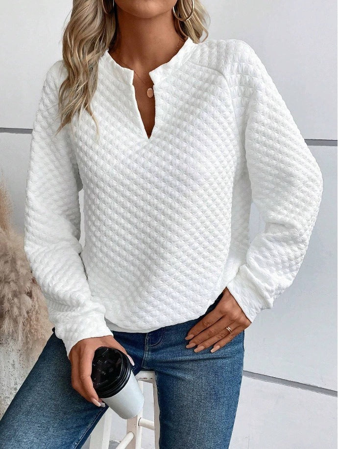Damer avslappnad tröja med strukturerad design och hög krage Mirla-Eva Jonsson