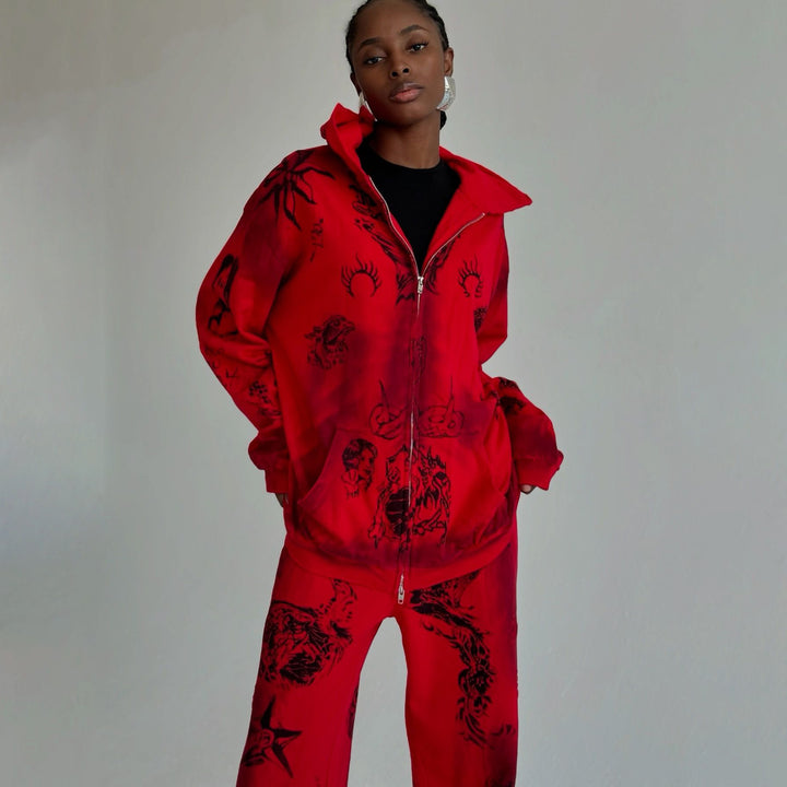 Damer avslappnad zip-hoodie med framträdande grafisk tryck Mirla-Eva Jonsson