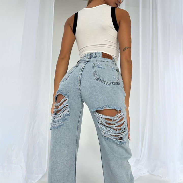 Damer avslappnade högmidjade jeans med fransiga detaljer Mirla-Eva Jonsson