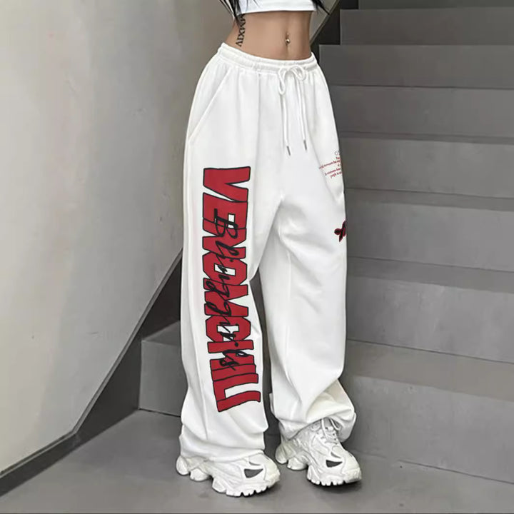 Damer avslappnade sweatpants med grafiskt tryck och elastisk midja Mirla-Eva Jonsson