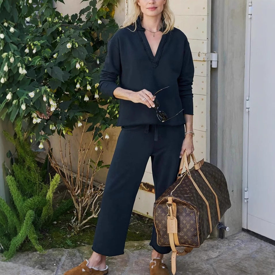 Damer avslappnat sweatpants-set med djup u-ringning Mirla-Eva Jonsson