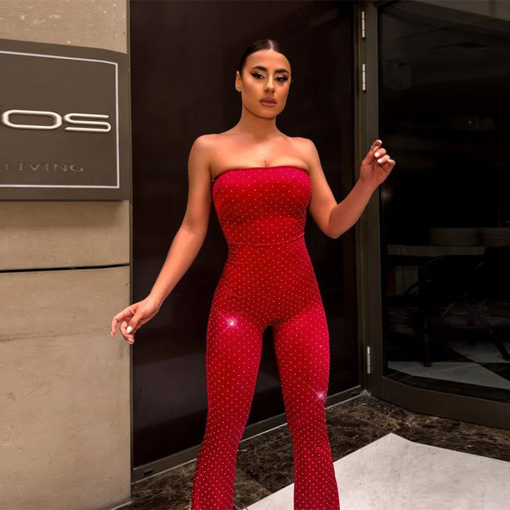 Damer axelbar jumpsuit med eleganta paljetter och skosöljor Mirla-Eva Jonsson