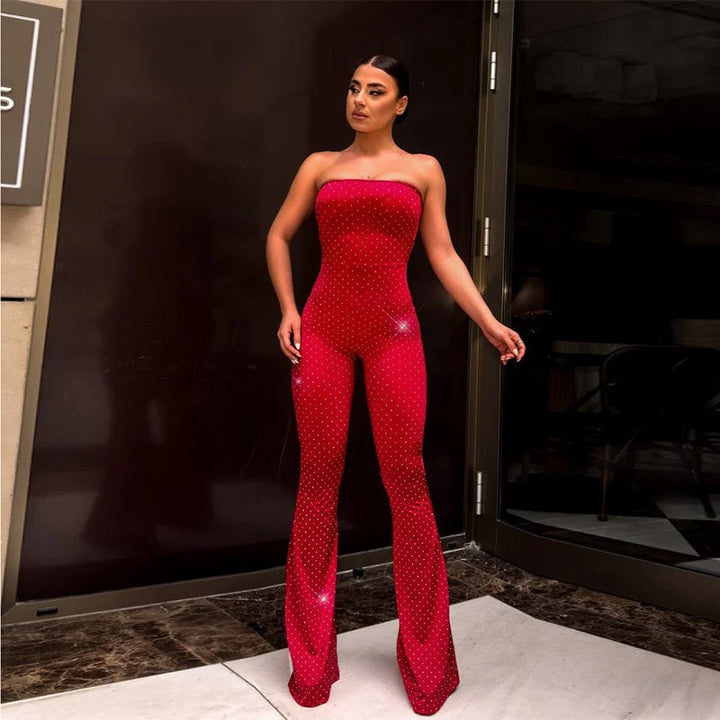 Damer axelbar jumpsuit med eleganta paljetter och skosöljor Mirla-Eva Jonsson
