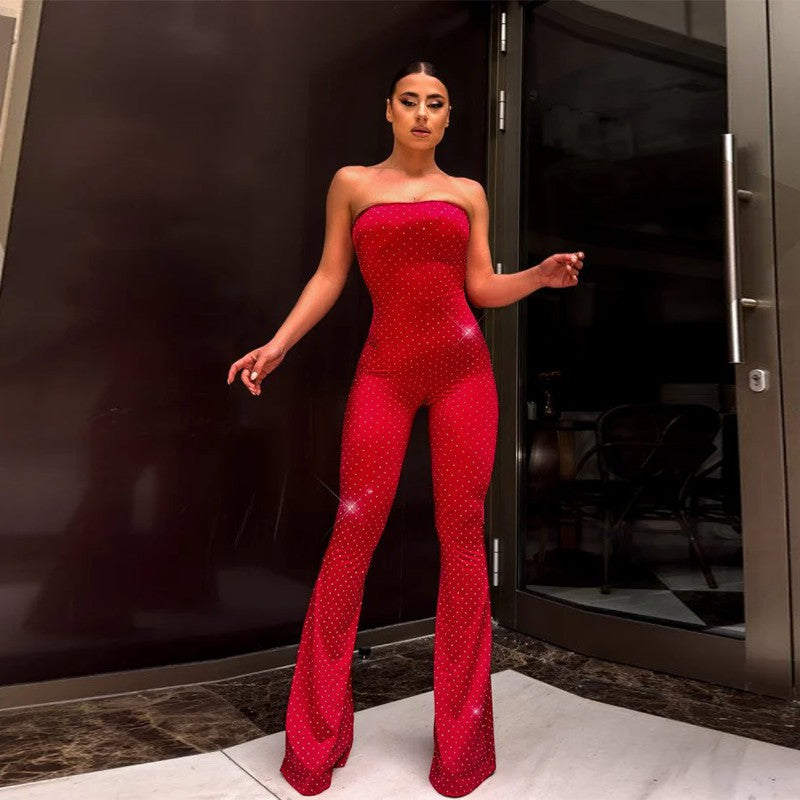 Damer axelbar jumpsuit med eleganta paljetter och skosöljor Mirla-Eva Jonsson