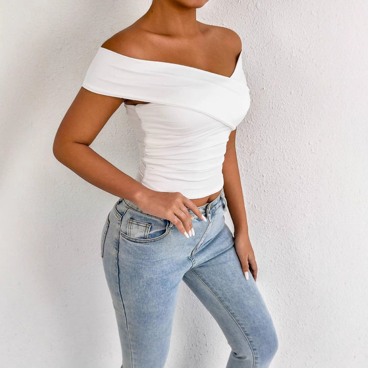 Damer axelbar topp med elegant drapering Mirla-Eva Jonsson