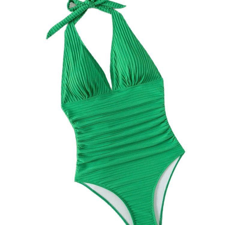 Damer baddräkt med djup V-ringning och eleganta ribbdetaljer Mirla-Eva Jonsson