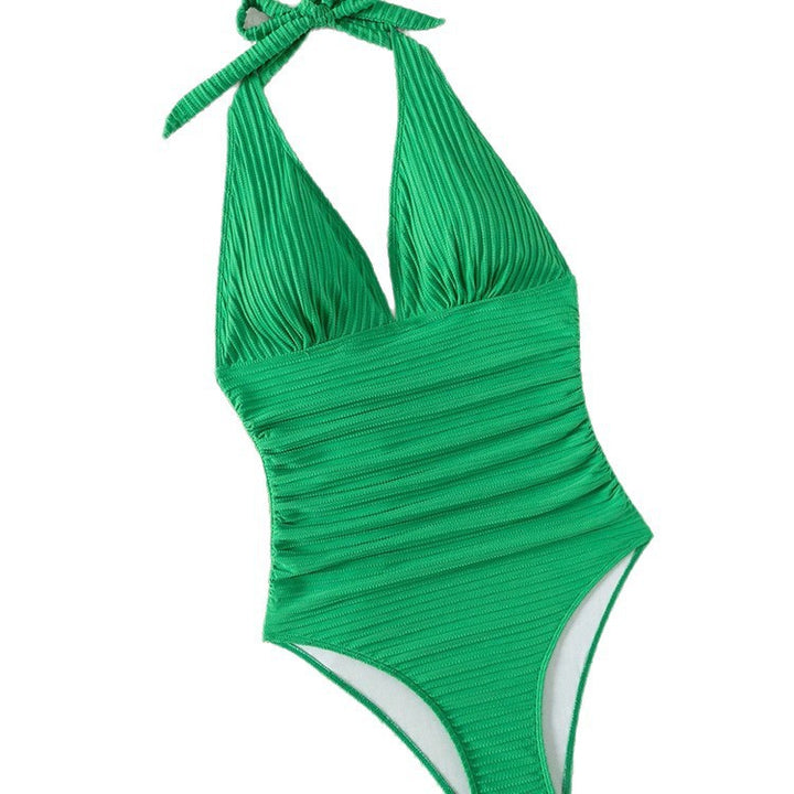 Damer baddräkt med djup V-ringning och eleganta ribbdetaljer Mirla-Eva Jonsson