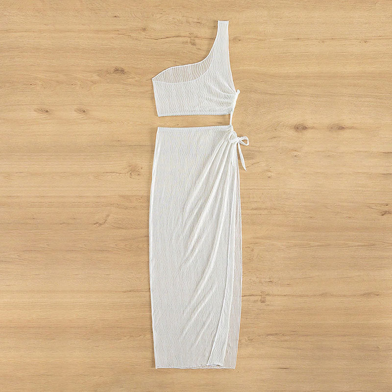 Damer bärvänligt knytdress med asymmetrisk överdel och elastisk midja Mirla-Eva Jonsson