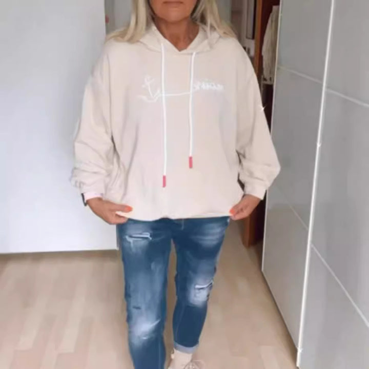 Damer bekväm hoodie med text Mirla-Eva Jonsson