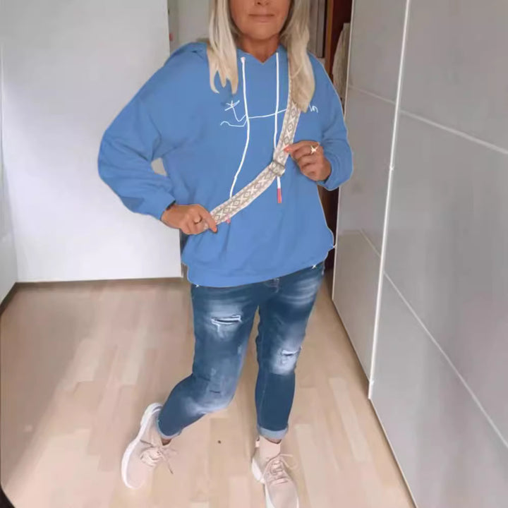 Damer bekväm hoodie med text Mirla-Eva Jonsson