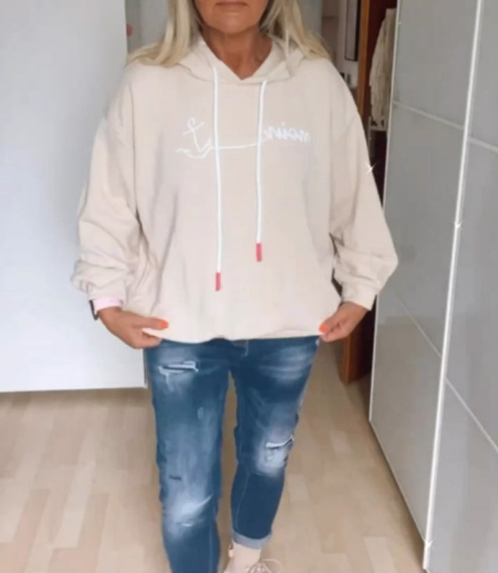 Damer bekväm hoodie med text Mirla-Eva Jonsson
