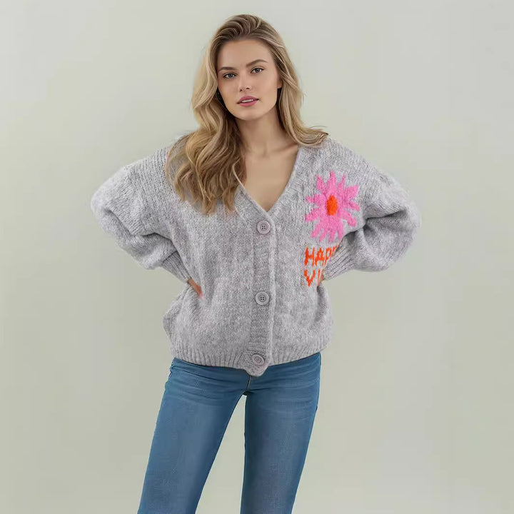 Damer bekväm stickad cardigan med blommig design och moderna knapppdetaljer Mirla-Eva Jonsson