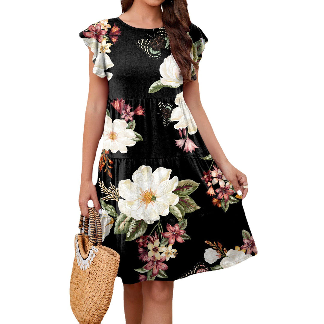 Damer blommor-midi-klänning med volangdetaljer och feminin silhuett Mirla-Eva Jonsson
