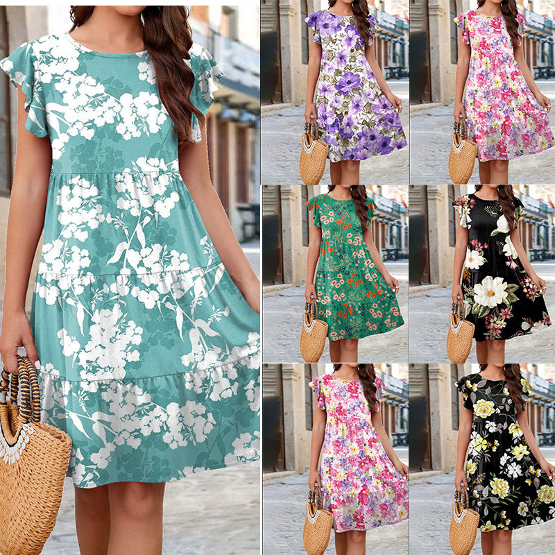 Damer blommor-midi-klänning med volangdetaljer och feminin silhuett Mirla-Eva Jonsson