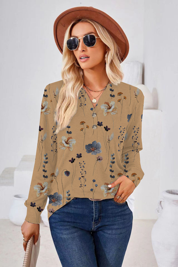 Damer blus T-shirt med blommönster och eleganta knappdetaljer Mirla-Eva Jonsson