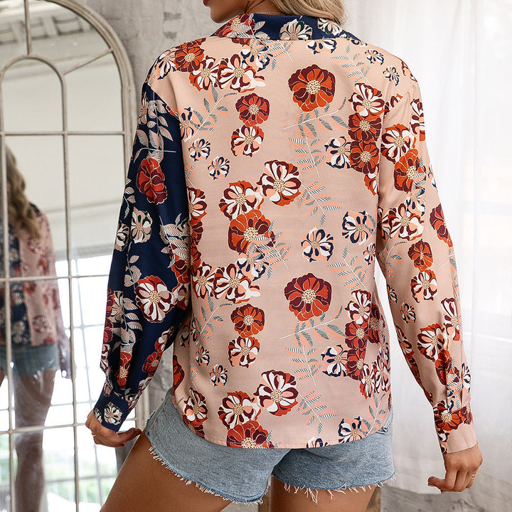Damer blus med blommig tryck och moderiktig knut Eva Jonsson-Eva Jonsson