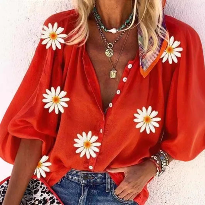 Damer blus med blommiga accenter och genomskinlig struktur Mirla-Eva Jonsson